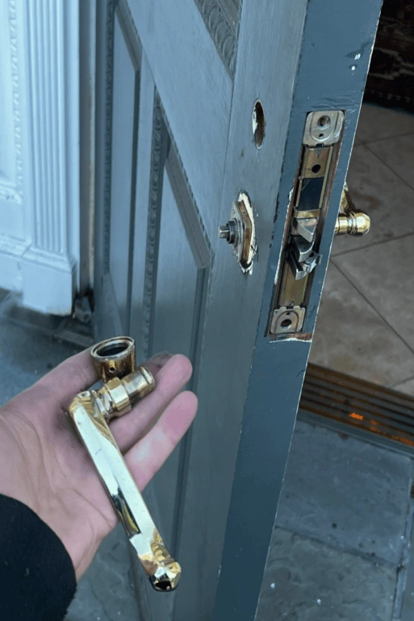 Broken residential door handle and misaligned latch in Aiken SC home