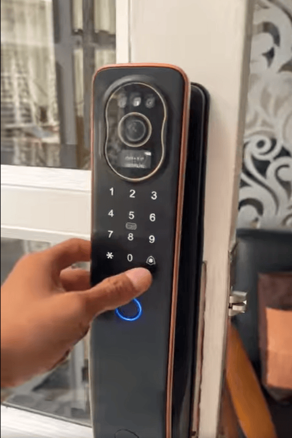 Licensed commercial locksmith operating 
biometric access control keypad for 
Aiken SC business property